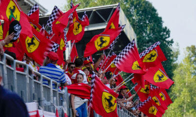 Ferrari supporters cheer on stands during the qualifying session ahead of Sunday's Formula One Italian Grand Prix auto race, at the Monza racetrack, in Monza, Italy, Saturday, Sept. 2, 2023. (AP Photo/Luca Bruno)