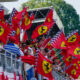 Ferrari supporters cheer on stands during the qualifying session ahead of Sunday's Formula One Italian Grand Prix auto race, at the Monza racetrack, in Monza, Italy, Saturday, Sept. 2, 2023. (AP Photo/Luca Bruno)