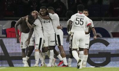 Nice's Terem Moffi, left, celebrates with his teammates after scoring his side's third goal during the French League One soccer match between Paris Saint Germain and Nice at Parc des Princes stadium in Paris, Friday, Sept. 15, 2023. (AP Photo/Michel Euler)