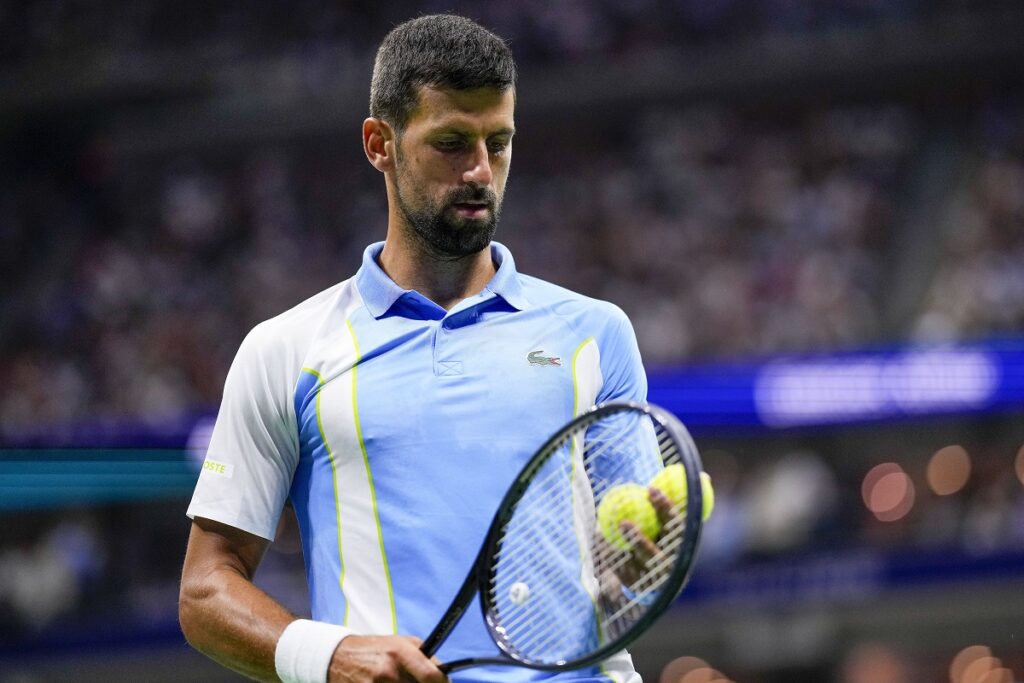 Novak Djokovic, of Serbia, prepares to serve to Ben Shelton, of the United States, during the men's singles semifinals of the U.S. Open tennis championships, Friday, Sept. 8, 2023, in New York. (