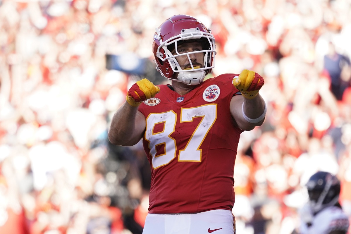 Kansas City Chiefs tight end Travis Kelce celebrates after scoring during the second half of an NFL football game against the Chicago Bears Sunday, Sept. 24, 2023, in Kansas City, Mo. (AP Photo/Ed Zurga)