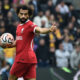 Liverpool's Mohamed Salah celebrates after Liverpool's Cody Gakpo scored his side's opening goal during the English Premier League soccer match between Wolverhampton and Liverpool at the Molineux stadium in Wolverhampton, England, Saturday, Sept. 16, 2023. (AP Photo/Rui Vieira)