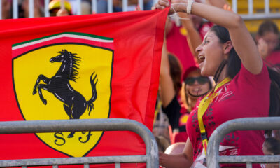 Ferrari supporters cheer on stands during the qualifying session ahead of Sunday's Formula One Italian Grand Prix auto race, at the Monza racetrack, in Monza, Italy, Saturday, Sept. 2, 2023. (AP Photo/Luca Bruno)