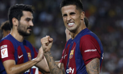 Barcelona's Joao Cancelo celebrates scoring his side's fifth goal during a Spanish La Liga soccer match between Barcelona and Betis at the Olympic Stadium of Montjuic in Barcelona, Spain, Saturday, Sept. 16, 2023. (AP Photo/Joan Monfort)