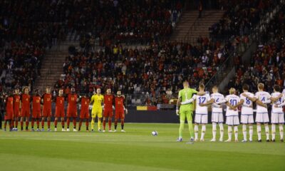 Squads observe a moment of silence for victims of recent violence in the Middle East before the Euro 2024 group F qualifying soccer match between Belgium and Sweden at the King Baudouin Stadium in Brussels, Monday, Oct. 16, 2023. (AP Photo/Geert Vanden Wijngaert)