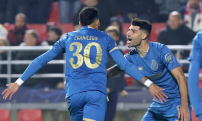Porto's Evanilson, left, celebrates with Mehdi Taremi after scoring his side's first goal during the Champions League Group H soccer match between Royal Antwerp and FC Porto at the Bosuil Stadium, Antwerp, Belgium, Wednesday, Oct. 25, 2023. (AP Photo/Francois Walschaerts)