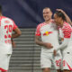Leipzig's David Raum, centre right, celebrates after scoring his side's opening goal during the group G Champions League soccer match between RB Leipzig and Red Star Belgrade at the Red Bull arena stadium in Leipzig, Germany, Wednesday, Oct. 25, 2023. (AP Photo/Matthias Schrader)