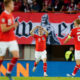 Austria's Marcel Sabitzer, centre, celebrates after scoring his side's second goal during the Euro 2024 group F qualifying soccer match between Austria and Belgium at the Ernst Happel stadium in Vienna, Austria, Friday, Oct. 13, 2023. (AP Photo/Florian Schroetter)
