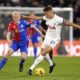 Tottenham Hotspur's Micky van de Ven, right, and Crystal Palace's Will Hughes battle for the ball during the English Premier League soccer match at Selhurst Park, London, Friday Oct. 27, 2023. (John Walton/PA via AP)