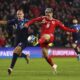 Wales' Harry Wilson, right, scores the team's first goal of the game, during the Euro 2024 Qualifying Group D match at the Cardiff City Stadium in Wales, Sunday, Oct. 15, 2023. (Tim Goode/PA via AP)