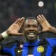 Inter Milan's Marcus Thuram celebrates after scoring his side's opening goal during the Serie A soccer match between Inter Milan and Roma at the San Siro Stadium, in Milan, Italy, Sunday, Oct. 29, 2023. (AP Photo/Antonio Calanni)