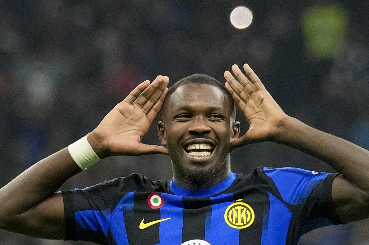 Inter Milan's Marcus Thuram celebrates after scoring his side's opening goal during the Serie A soccer match between Inter Milan and Roma at the San Siro Stadium, in Milan, Italy, Sunday, Oct. 29, 2023. (AP Photo/Antonio Calanni)