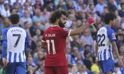 Liverpool's Mohamed Salah, centre, reacts after the Premier League soccer match between Brighton and Hove Albion and Liverpool at the American Express Community Stadium in Brighton, England, Sunday, Oct. 8, 2023. (AP Photo/Alberto Pezzali)