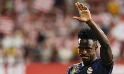 Real Madrid's Vinicius Junior greets fans at the end of the a Spanish La Liga soccer match between Girona and Real Madrid, at the Montilivi stadium in Girona, Spain, Saturday, Sept. 30, 2023. (AP Photo/Joan Monfort)