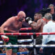 Tyson Fury, of England, the WBC and lineal heavyweight champion, fights with former UFC heavyweight champion Francis Ngannou, of Cameroon, during their boxing match to mark the start of Riyadh Season at Kingdom Arena, in Riyadh, Saudi Arabia, Sunday, Oct. 29, 2023. (AP Photo/Yazeed Aldhawaihi)