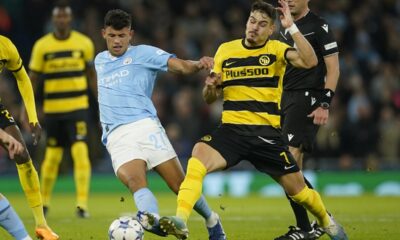Manchester City's Matheus Nunes, left, is challenged by Young Boys' Filip Ugrinic during the group G Champions League soccer match between Manchester City and Young Boys at the Etihad Stadium in Manchester, England, Tuesday, Nov. 7, 2023. (AP Photo/Dave Thompson)