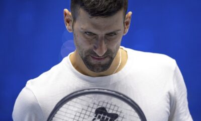 Serbia's Novak Djokovic looks down during a training session ahead of the ATP Finals, in Turin, Italy, Friday, Nov. 10, 2023. (Marco Alpozzi/LaPresse via AP)