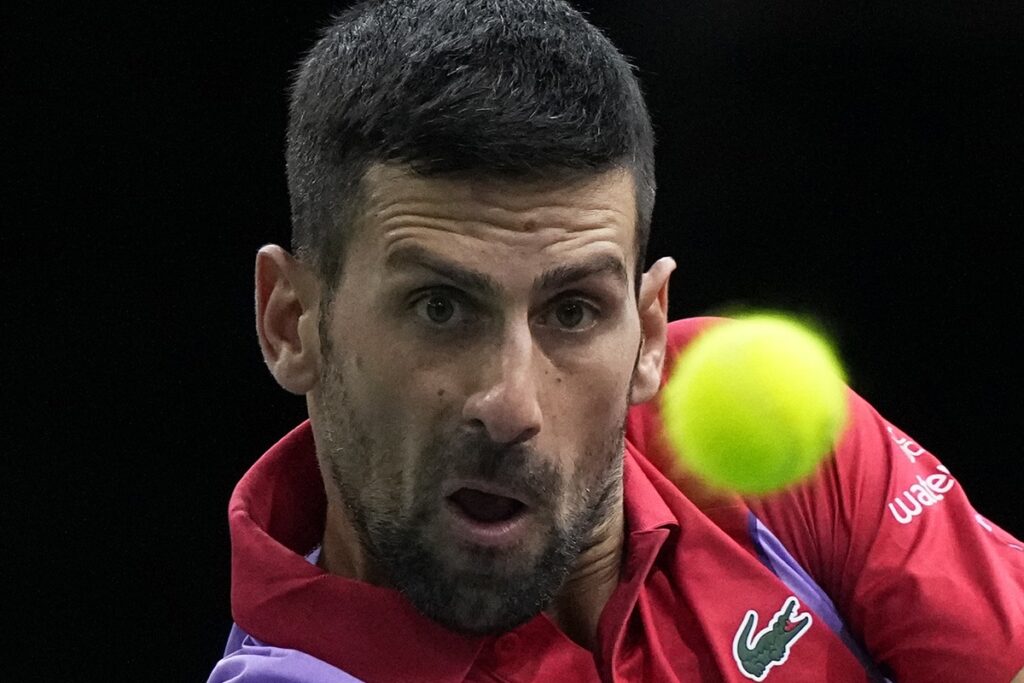 Serbia's Novak Djokovic eyes the ball as he plays Argentina's Tomas Martin Etcheverry during the second round of the Paris Masters tennis tournament, at the Accor Arena, Wednesday Nov.1, 2023 in Paris. (AP Photo/Michel Euler)