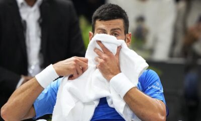 Serbia's Novak Djokovic wipes her face with a towel during the quarterfinal match against Denmark's Holger Rune at the Paris Masters tennis tournament, at the Accor Arena in Paris, Friday, Nov. 3, 2023. (AP Photo/Michel Euler)