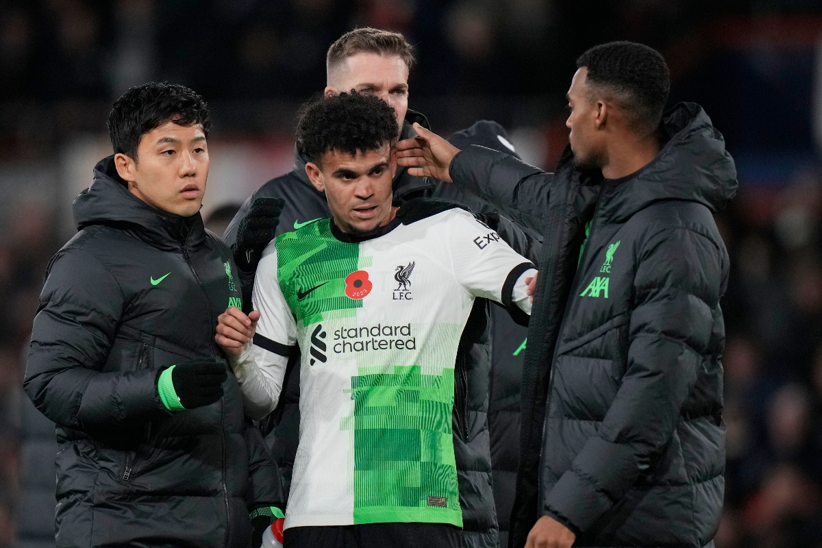 Liverpool's Luis Diaz celebrates with his teammates at the end of the English Premier League soccer match between Luton Town and Liverpool, at Kenilworth Road, in Luton, England, Sunday, Nov. 5, 2023. (Alastair Grant)