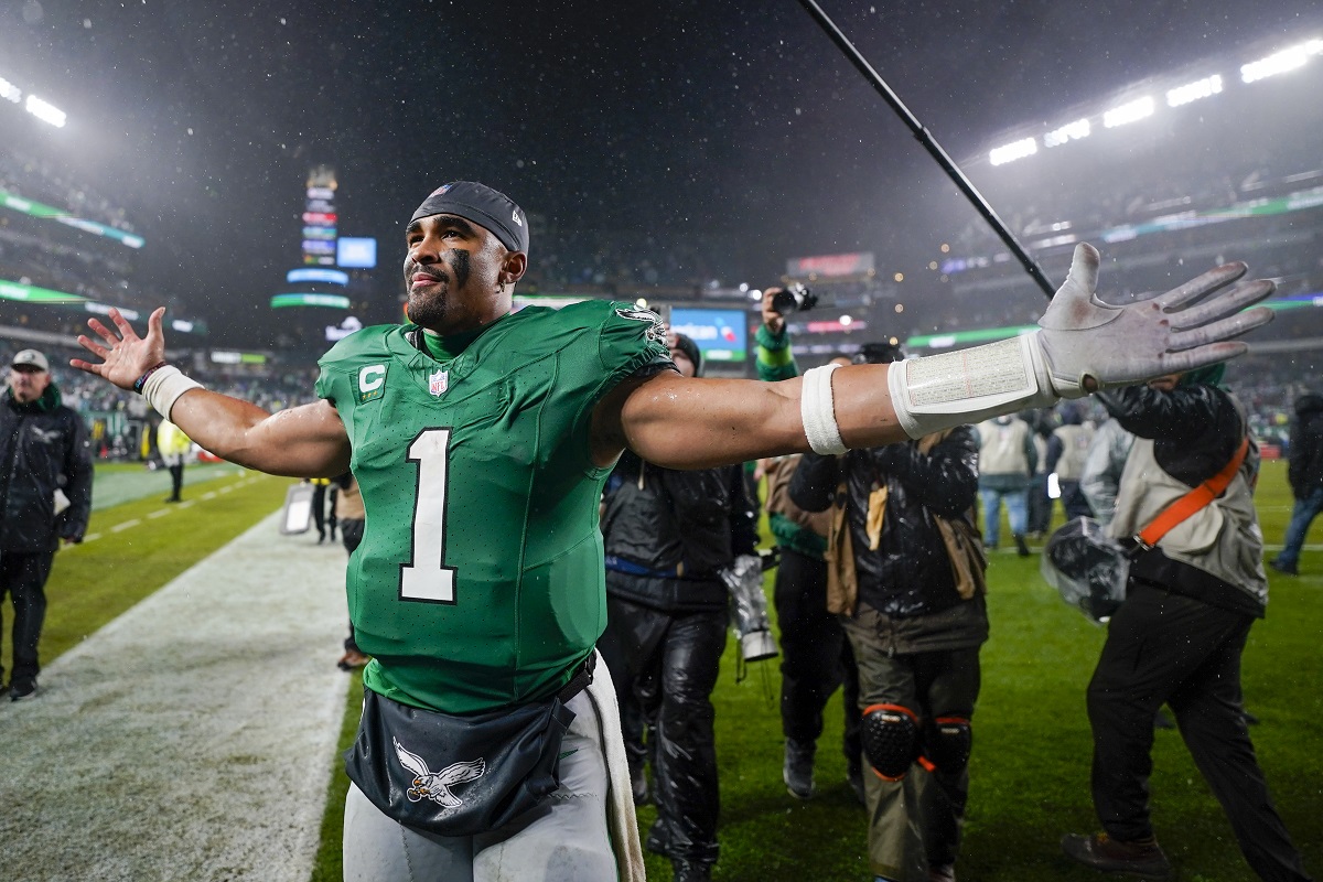 Philadelphia Eagles quarterback Jalen Hurts celebrates after scoring the game winning touchdown against the Buffalo Bills during overtime in an NFL football game Sunday, Nov. 26, 2023, in Philadelphia. (AP Photo/Matt Slocum)