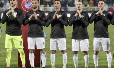 Israel's players gesture and sing the Israeli national anthem prior to the Euro 2024 group I qualifying soccer match between Kosovo and Israel at the Fadil Vokrri stadium in Pristina, Kosovo, Sunday, Nov. 12, 2023. (AP Photo/Visar Kryeziu)