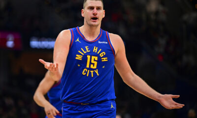 Denver Nuggets center Nikola Jokic disputes a non-call with an official in the first half of an NBA basketball game against the Cleveland Cavaliers, Sunday, Nov. 19, 2023, in Cleveland. (AP Photo/David Dermer)
