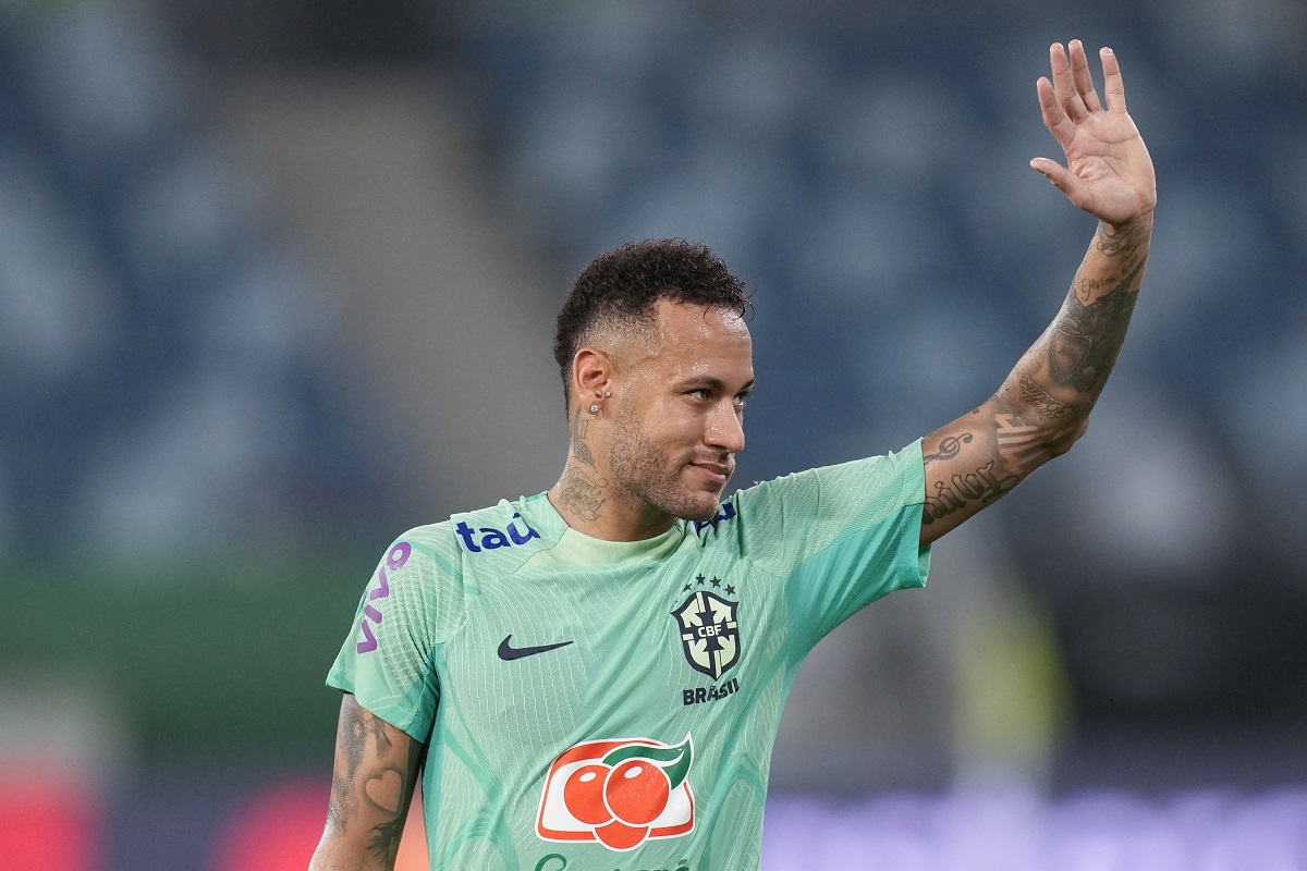 FILE - Brazil's Neymar waves to fans during a training session in Cuiaba, Brazil, Tuesday, Oct. 10, 2023. Armed robbers entered the home of Brazilian soccer star Neymar's wife's parents and took the older couple hostage early Tuesday, Nov. 7, Neymar's wife, Bruna Biancardi, wrote on her verified Instagram account.(AP Photo/Andre Penner, File)