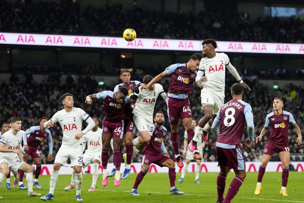 Tottenham players, in white, try and fail to score during the English Premier League soccer match between Tottenham Hotspur and Aston Villa at the Tottenham Hotspur stadium in London, Sunday, Nov. 26, 2023. (AP Photo/Kirsty Wigglesworth)