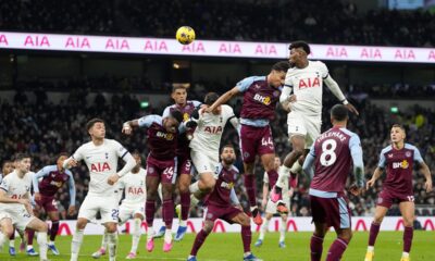 Tottenham players, in white, try and fail to score during the English Premier League soccer match between Tottenham Hotspur and Aston Villa at the Tottenham Hotspur stadium in London, Sunday, Nov. 26, 2023. (AP Photo/Kirsty Wigglesworth)