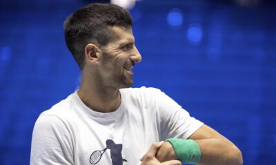 Serbia's Novak Djokovic stretches his wrist during a training session ahead of the ATP Finals, in Turin, Italy, Friday, Nov. 10, 2023. (Marco Alpozzi/LaPresse via AP)