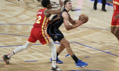 Orlando Magic's Franz Wagner looks to shoot against the Atlanta Hawks' Hunter De'Andre, during the first half of an NBA basketball game, at the Mexico Arena in Mexico City, Thursday, Nov. 9, 2023. (AP Photo/Eduardo Verdugo)