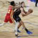 Orlando Magic's Franz Wagner looks to shoot against the Atlanta Hawks' Hunter De'Andre, during the first half of an NBA basketball game, at the Mexico Arena in Mexico City, Thursday, Nov. 9, 2023. (AP Photo/Eduardo Verdugo)