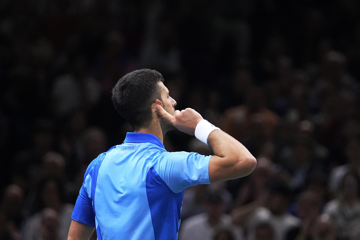 Serbia's Novak Djokovic reacts during the quarterfinal match against Denmark's Holger Rune of the Paris Masters tennis tournament, at the Accor Arena in Paris, Friday, Nov. 3, 2023. (AP Photo/Michel Euler)