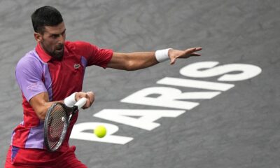 Serbia's Novak Djokovic returns the ball to Argentina's Tomas Martin Etcheverry during the second round of the Paris Masters tennis tournament, at the Accor Arena, Wednesday Nov.1, 2023 in Paris. (AP Photo/Michel Euler)