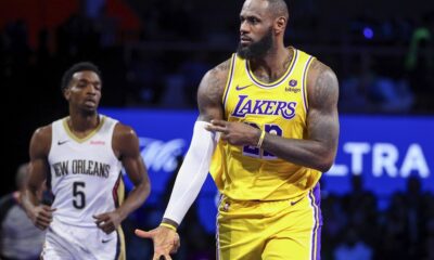 Los Angeles Lakers forward LeBron James (23) celebrates after making a 3-point basket against the New Orleans Pelicans during the first half of a semifinal in the NBA basketball In-Season Tournament, Thursday, Dec. 7, 2023, in Las Vegas. (AP Photo/Ian Maule)