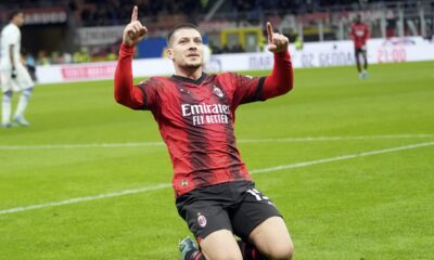 AC Milan's Luka Jovic celebrates after scoring the opening goal during the Serie A soccer match between AC Milan and Frosinone at the San Siro stadium, in Milan, Italy, Friday, Dec. 2, 2023. (AP Photo/Luca Bruno)