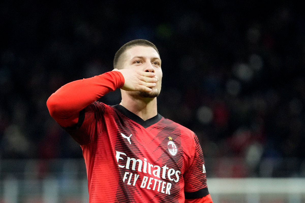AC Milan's Luka Jovic celebrates after scoring the opening goal during the Serie A soccer match between AC Milan and Frosinone at the San Siro stadium, in Milan, Italy, Friday, Dec. 2, 2023. (AP Photo/Luca Bruno)