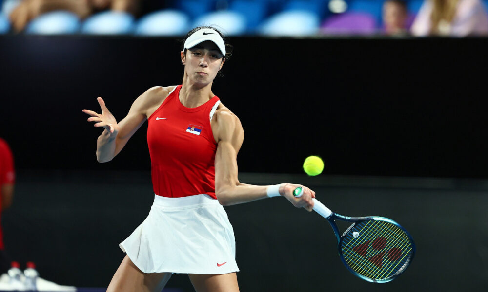 Olga Danilovic of Serbia plays a return shot to Qinwen Zheng of China during the United Cup tennis tournament in Perth, Australia, Sunday, Dec. 31, 2023. (AP Photo/Trevor Collens)