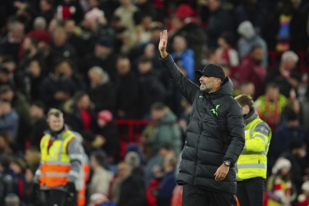Liverpool's manager Jurgen Klopp applauds fans at the end of the English Premier League soccer match between Liverpool and Arsenal at Anfield stadium in Liverpool, England, Saturday, Dec. 23, 2023. (AP Photo/Jon Super)