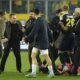 Referee Halil Umut Meler is seen lying on the ground, right, after being punched by MKE Ankaragucu president Faruk Koca, second from left, at the end of the Turkish Super Lig soccer match between MKE Ankaragucu and Caykur Rizespor in Ankara, Monday, Dec. 11, 2023. The Turkish Football Federation has suspended all league games in the country after a club president punched the referee in the face at the end of a top-flight match. Koca was arrested Tuesday, Dec. 12, 2023, along with two other people on charges of injuring a public official following questioning by prosecutors. (Abdurrahman Antakyali/Depo Photos via AP)