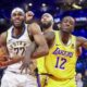 Indiana Pacers forward Isaiah Jackson (22) grabs a rebound next to Los Angeles Lakers forwards Anthony Davis and Taurean Prince (12) during the first half of the championship game in the NBA basketball In-Season Tournament on Saturday, Dec. 9, 2023, in Las Vegas. (AP Photo/Ian Maule)
