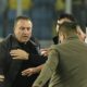 An unidentified man kicks referee Halil Umut Meler who is lying on the ground after he was also punched by MKE Ankaragucu president Faruk Koca, left, at the end of the Turkish Super Lig soccer match between MKE Ankaragucu and Caykur Rizespor in Ankara, Monday, Dec. 11, 2023. The Turkish Football Federation has suspended all league games in the country after a club president punched the referee in the face at the end of a top-flight match. Koca was arrested Tuesday, Dec. 12, 2023, along with two other people on charges of injuring a public official following questioning by prosecutors. (Abdurrahman Antakyali/Depo Photos via AP)