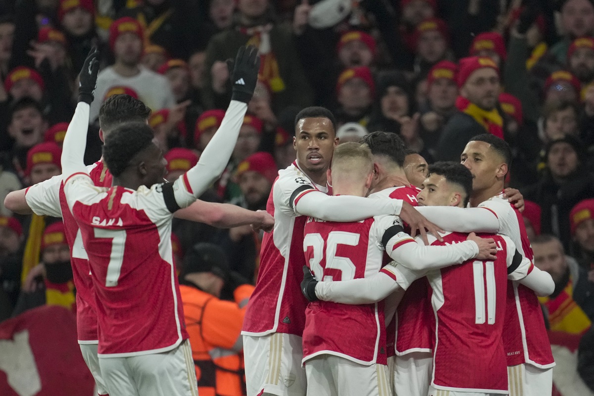 Arsenal's Kai Havertz celebrates with teammates after scoring his side's opening goal during the Champions League Group B soccer match between Arsenal and Lens, at Emirates stadium, in London, Wednesday, Nov. 29, 2023. (AP Photo/Kin Cheung)