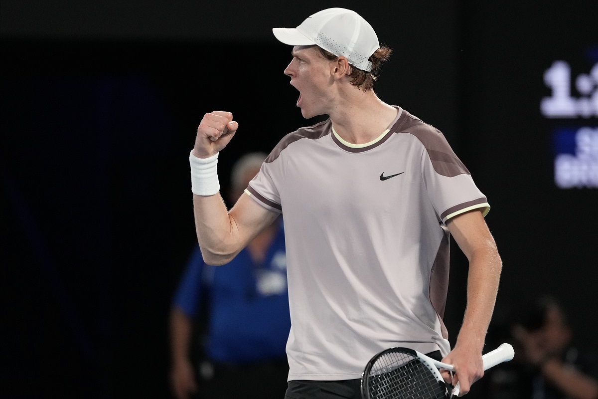 Jannik Sinner of Italy reacts after winning the second set against Andrey Rublev of Russia during their quarterfinal match at the Australian Open tennis championships at Melbourne Park, Melbourne, Australia, Wednesday, Jan. 24, 2024. (AP Photo/Alessandra Tarantino)