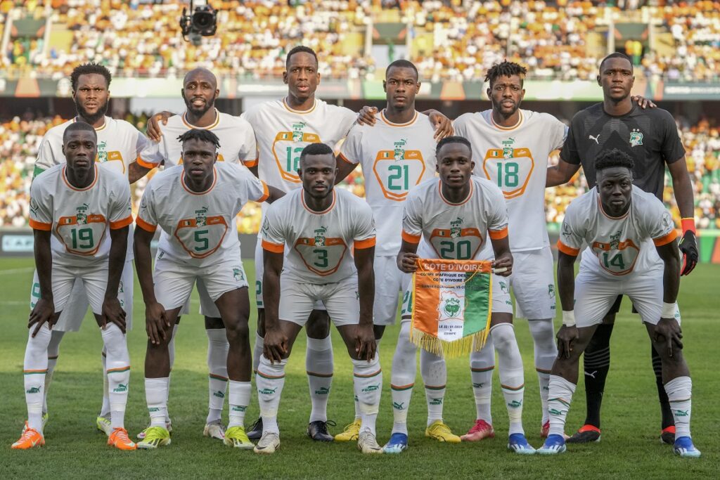 Ivory Coast team poses for a group photo prior to the African Cup of Nations Group A soccer match between Ivory Coast and Equatorial Guinea at the Olympic Stadium of Ebimpe in Abidjan, Ivory Coast, Monday, Jan. 22, 2024. (AP Photo/Sunday Alamba)