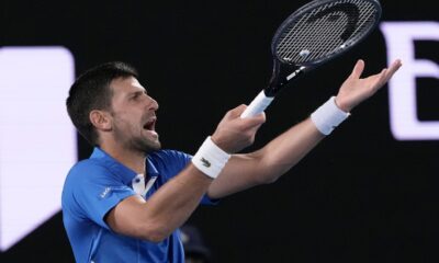 Serbia's Novak Djokovic reacts during his first round match against Croatia's Dino Prizmic at the Australian Open tennis championships at Melbourne Park, Melbourne, Australia, Sunday, Jan. 14, 2024. (AP Photo/Andy Wong)