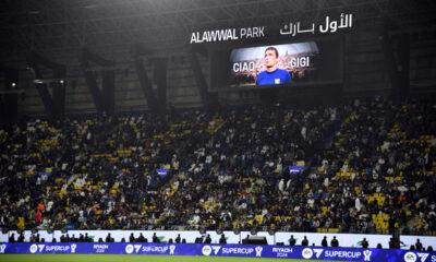 An image of Gigi Riva is projected on a giant screen ahead of the Italian Super Cup final soccer match between Inter Milan and Napoli at Al Awwal Park Stadium in Riyadh, Saudi Arabia, Monday, Jan. 22, 2024. Italy’s all-time leading goalscorer Luigi Riva has died. He was 79. The Italian soccer federation has confirmed the news and tributes have started flooding in for Riva. Riva remains Italy’s leading goalscorer, having netted 35 times in 42 appearances. As a player, he helped the Azzurri win the European Championship in 1968 and finish runners-up at the World Cup, two years later.He was also team manager of the national team from 1990-2013 and was instrumental in Italy winning its fourth World Cup in 2006. (Massimo Paolone/LaPresse via AP)