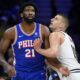 Philadelphia 76ers' Joel Embiid, elft, and Denver Nuggets' Nikola Jokic struggle for position during the first half of an NBA basketball game, Tuesday, Jan. 16, 2024, in Philadelphia. (AP Photo/Matt Slocum)