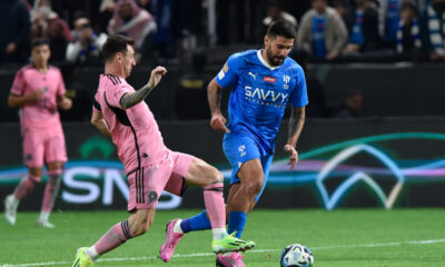 Inter Miami's Lionel Messi, left, in action during the Riyadh Season Cup soccer match between Inter Miami and Al Hilal at Kingdom Arena Stadium in Riyadh, Saudi Arabia, Monday, Jan. 29, 2024. (AP Photo)